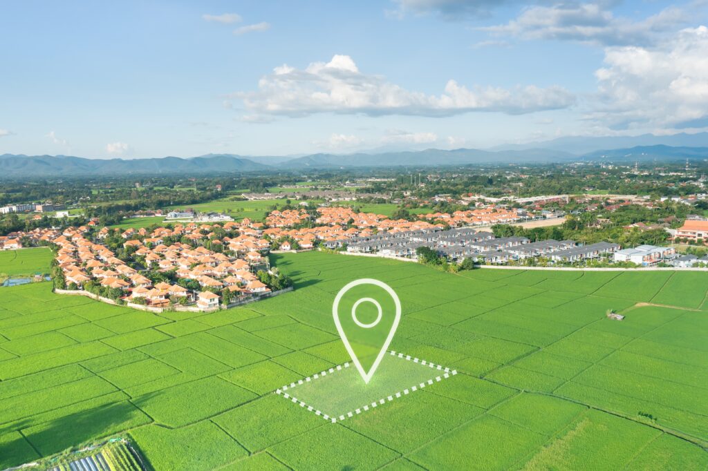 Land plot in aerial view. Identify registration symbol of vacant area for map.